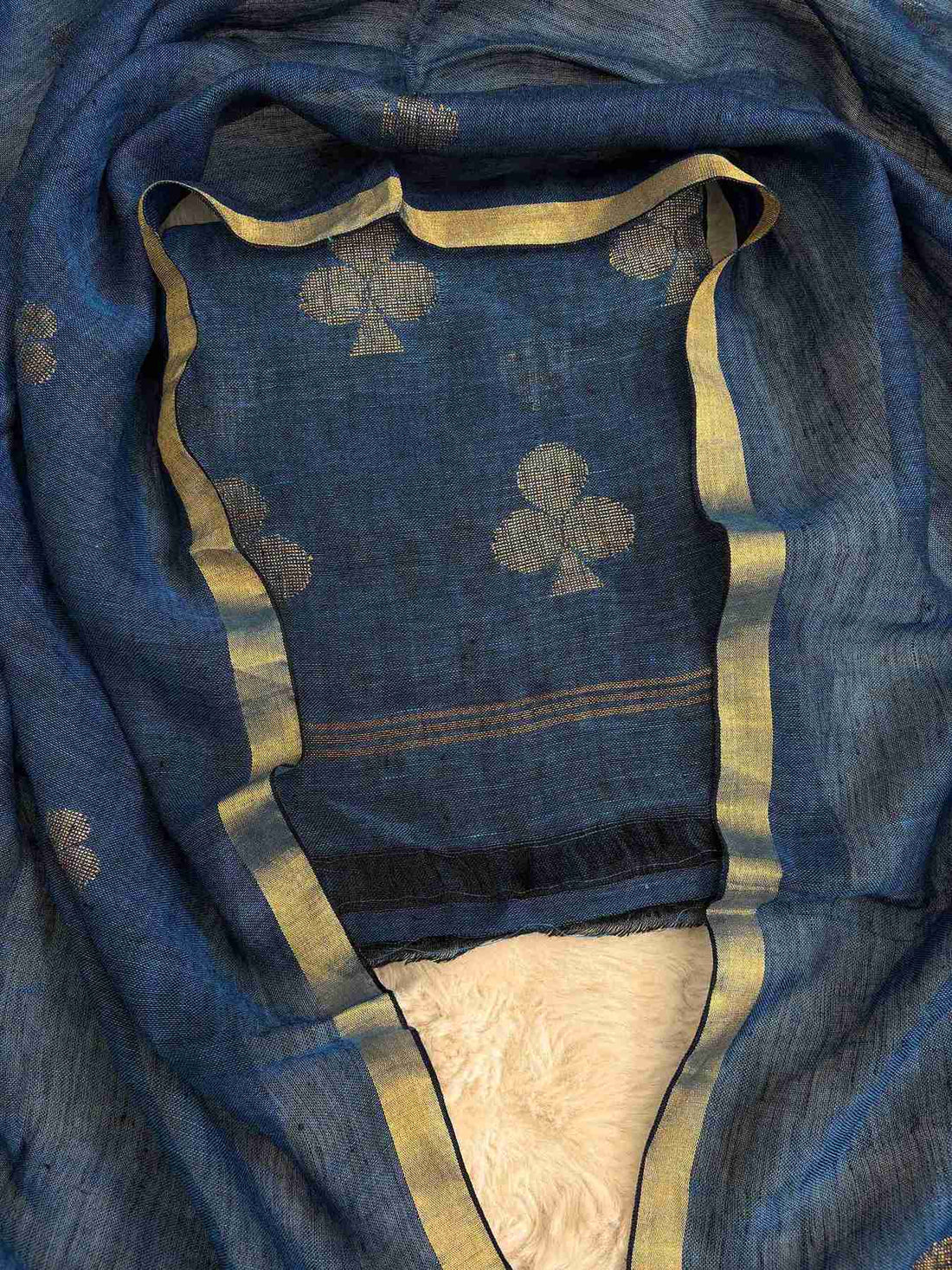 Scattered golden geometric spade woven motifs across teal-blue pure handloom linen shirt body