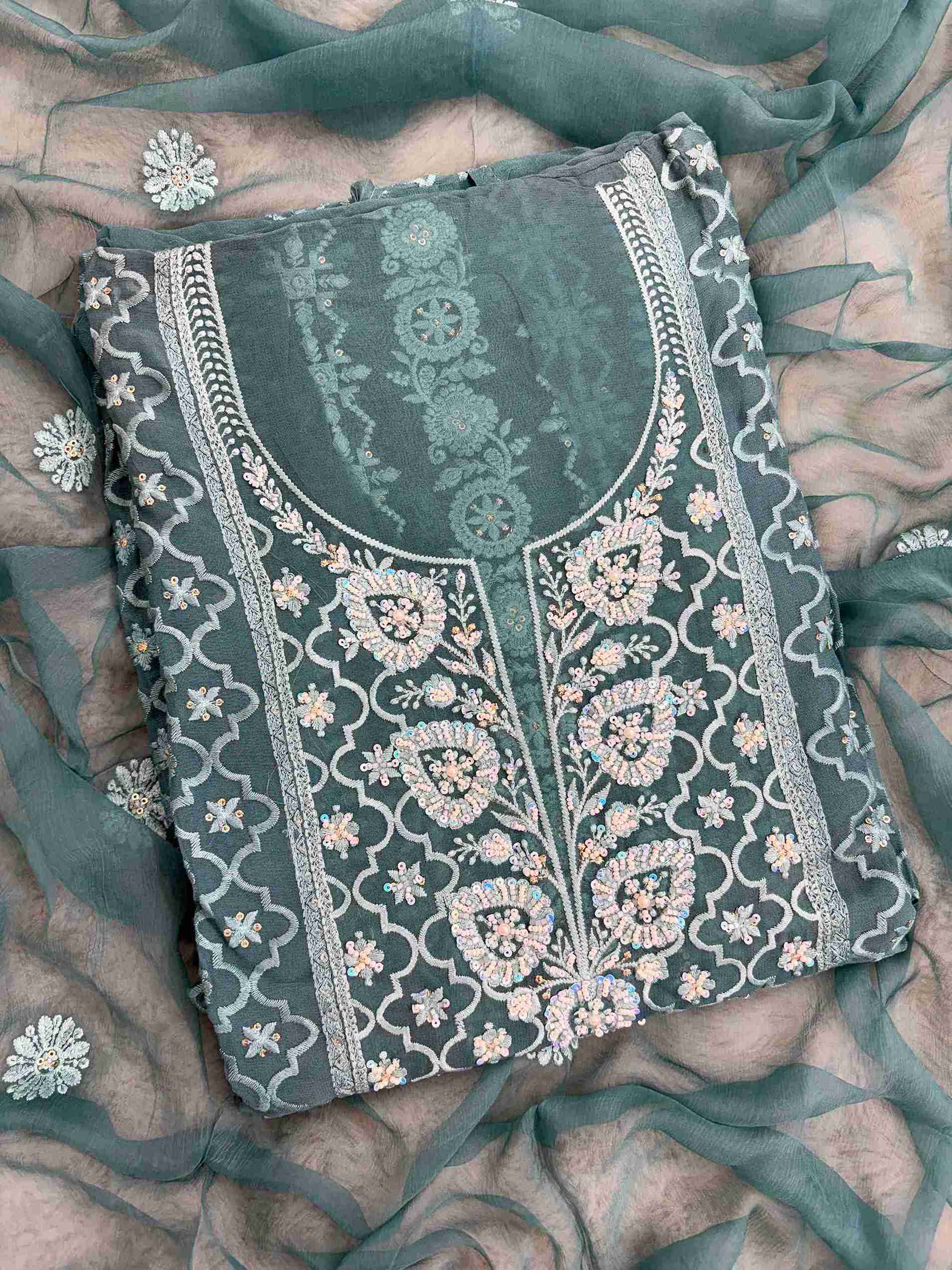 Teal suit neckline with moti beads and sequence embellishment