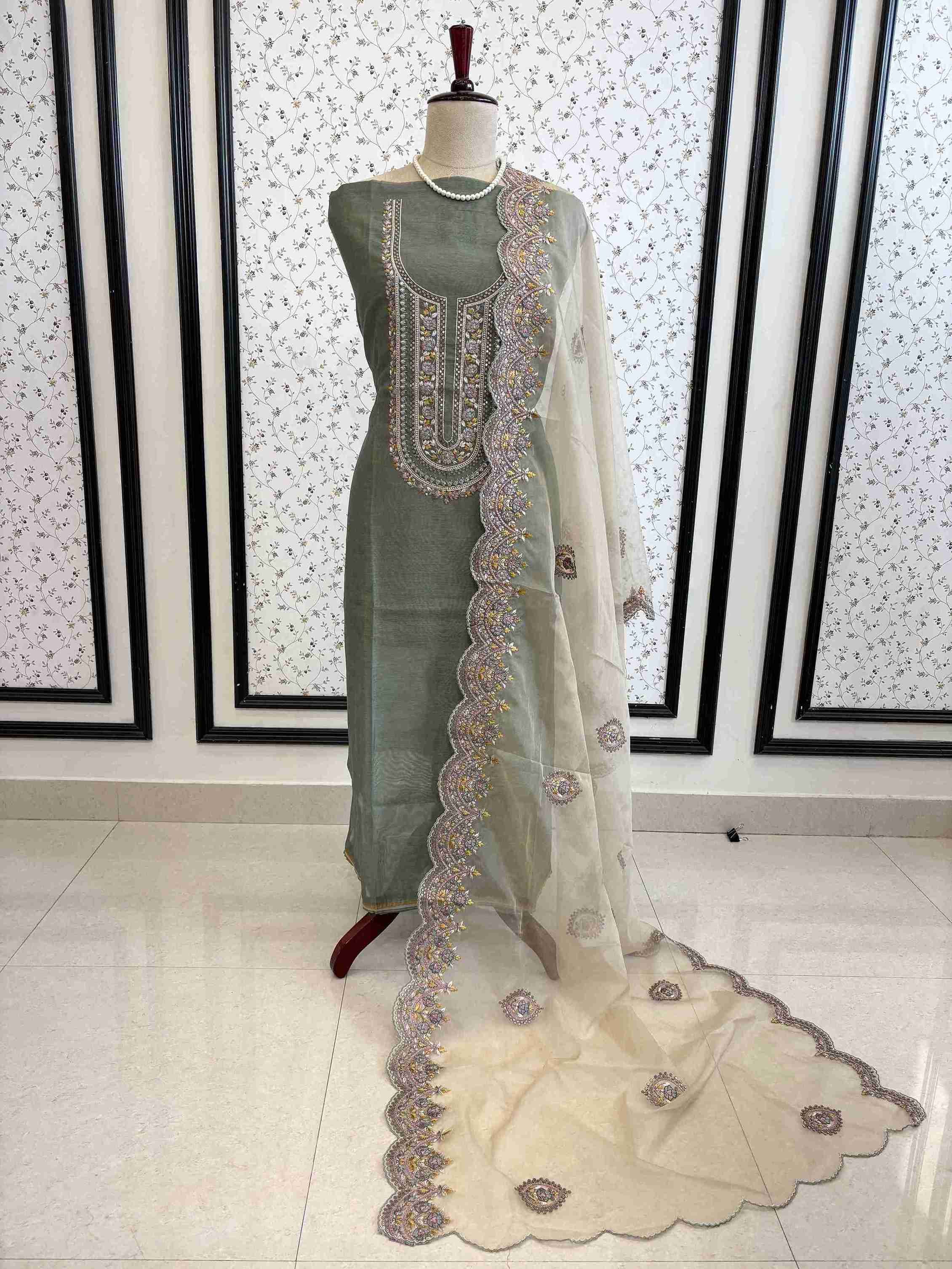 Complete Khaadi Chanderi unstitched suit set with organza dupatta on manequinn