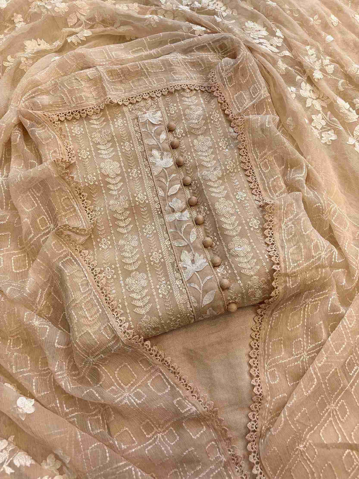 Warm beige chikankari and applique georgette unstitched suit with chiffon dupatta