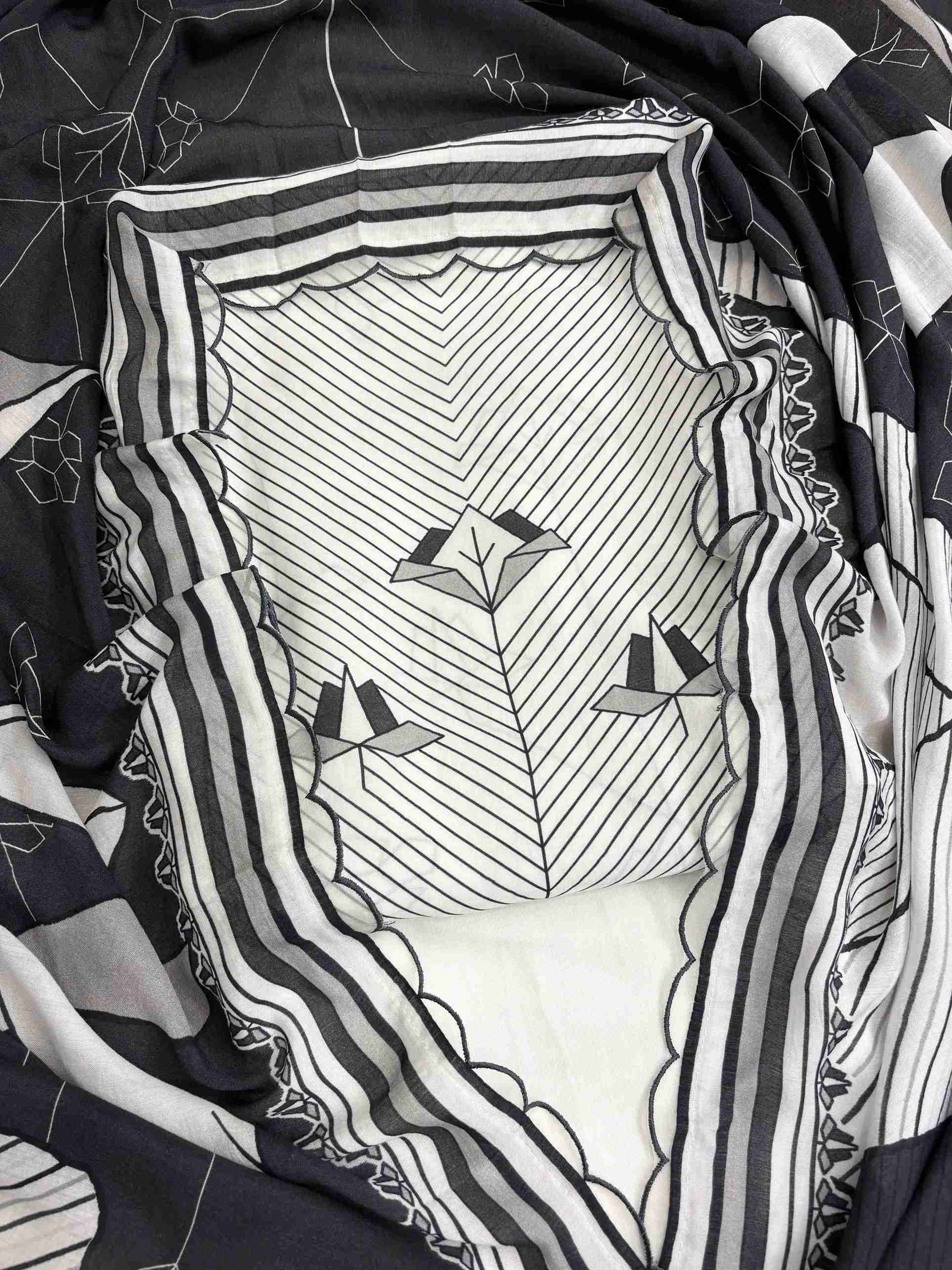 Front view of white and black pure muslin shirt featuring elegant digital print design