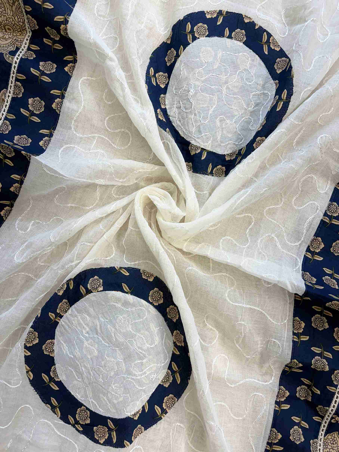 White cotton dupatta with navy blue and golden applique borders and large circular applique motifs