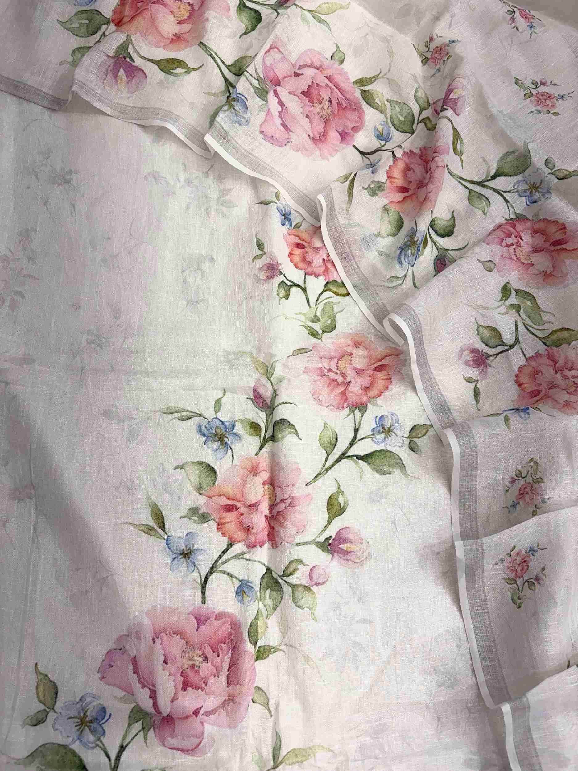 Complete white pure linen unstitched suit flat lay set with shirt, dupatta, and linen bottom