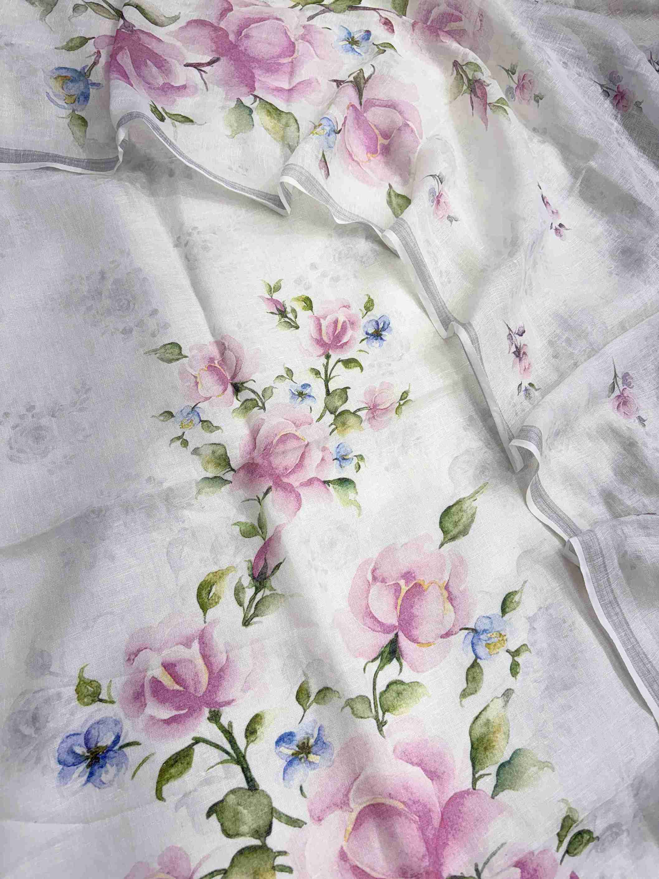 Complete white pure linen unstitched suit flat lay set with shirt, dupatta, and linen bottom showing mauve-pink floral print