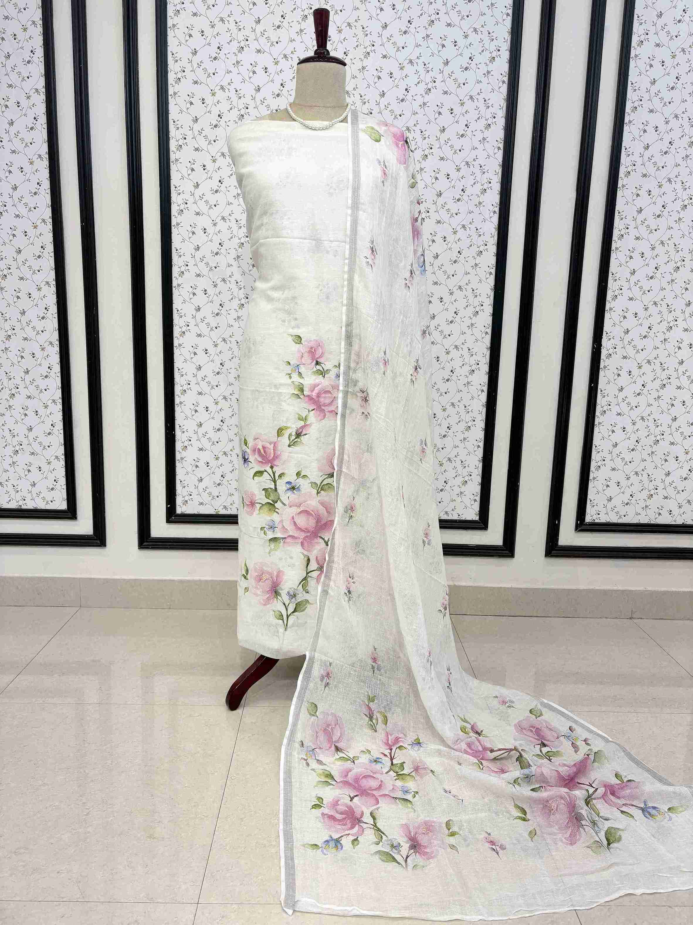 White pure linen unstitched suit full front view with mauve-pink digital floral printed dupatta draped on mannequin