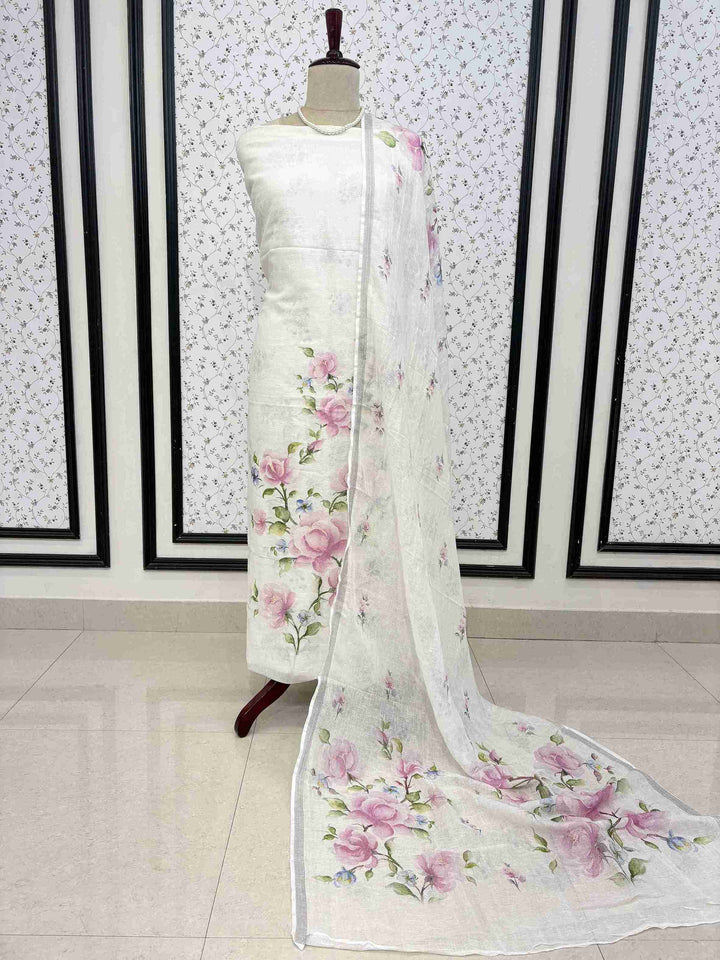 White pure linen unstitched suit full front view with mauve-pink digital floral printed dupatta draped on mannequin