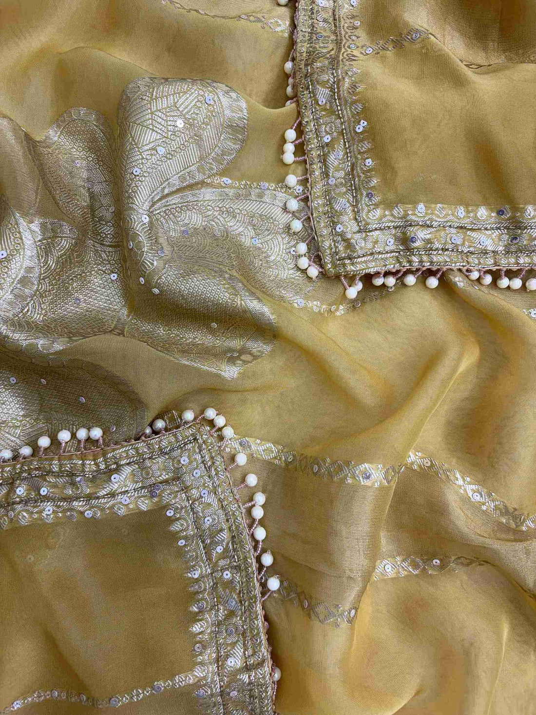 Yellow shimmer organza dupatta with Banarasi floral impression and striped pattern