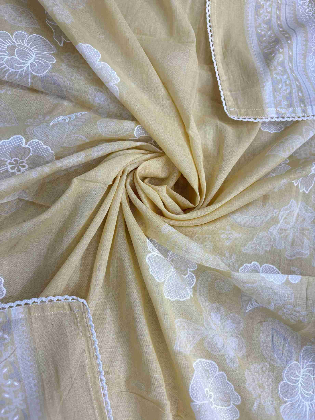 All-over white floral digital print with white lace border finishing on yellow cotton dupatta