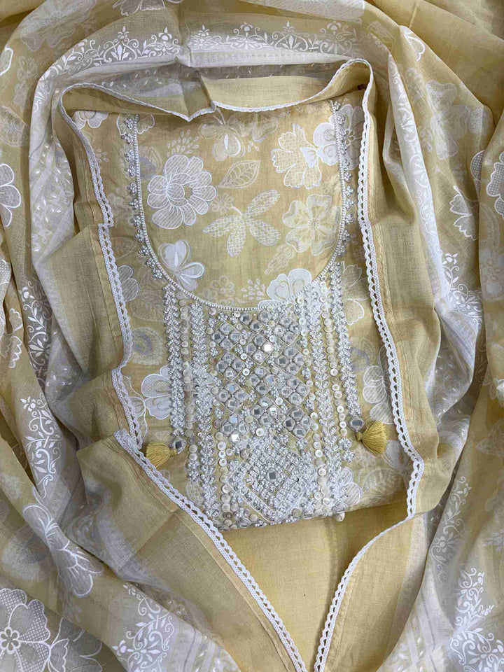 All-over white floral texture print detail across yellow cotton shirt body
