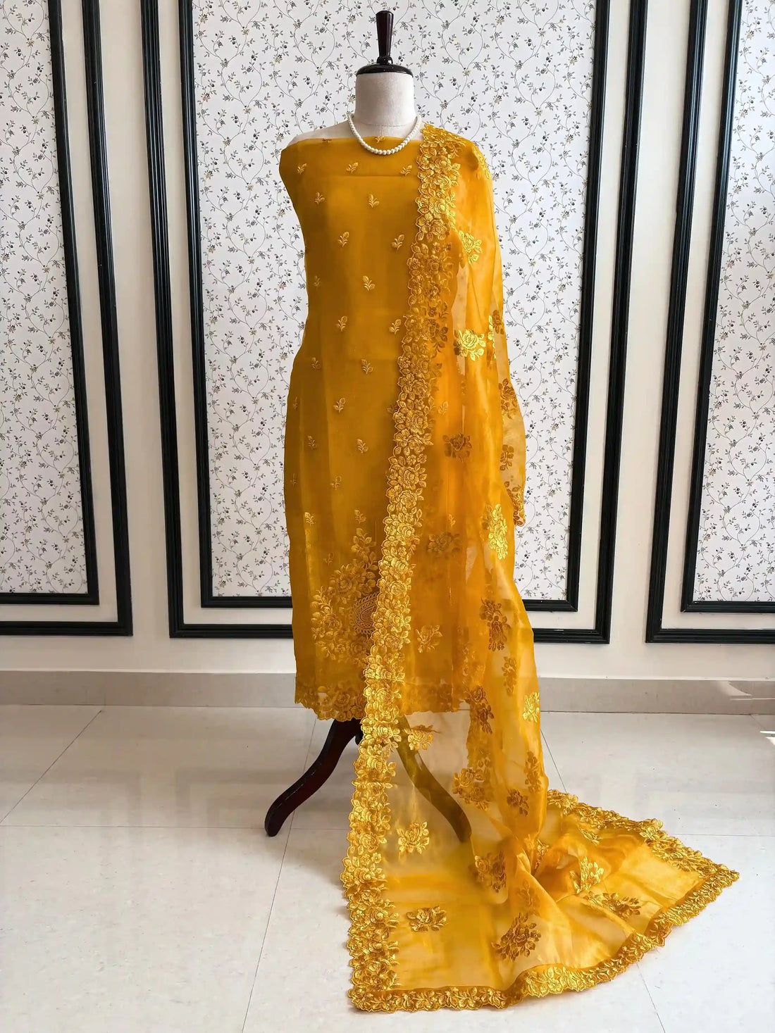 Complete yellow designer glass tissue unstitched suit set display