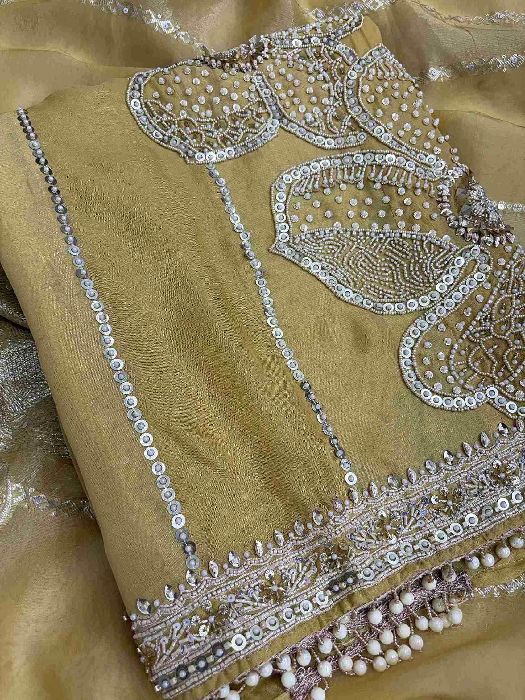 Front view of yellow shimmer organza shirt with vertical sequin stripe detailing