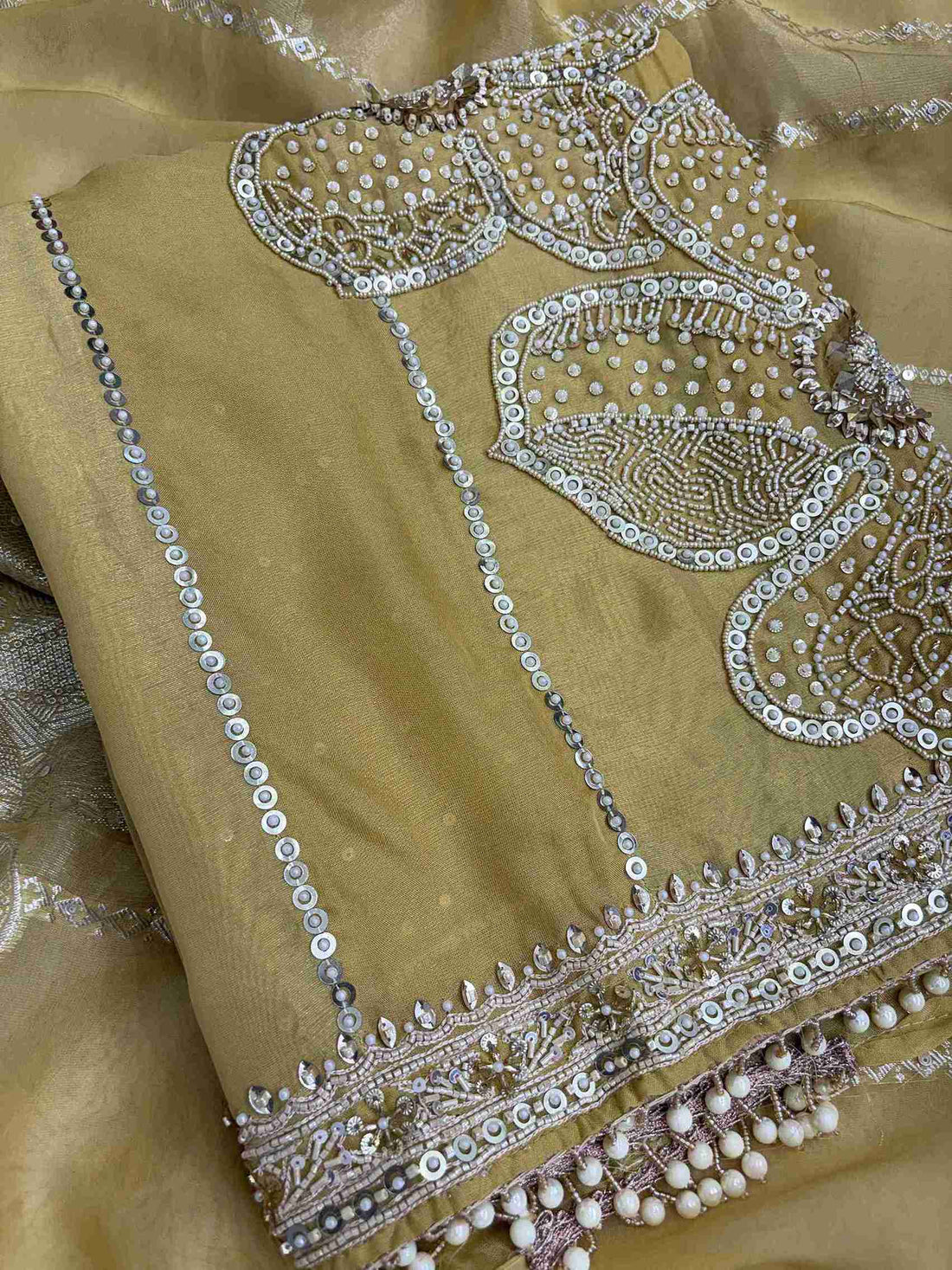 Front view of yellow shimmer organza shirt with vertical sequin stripe detailing